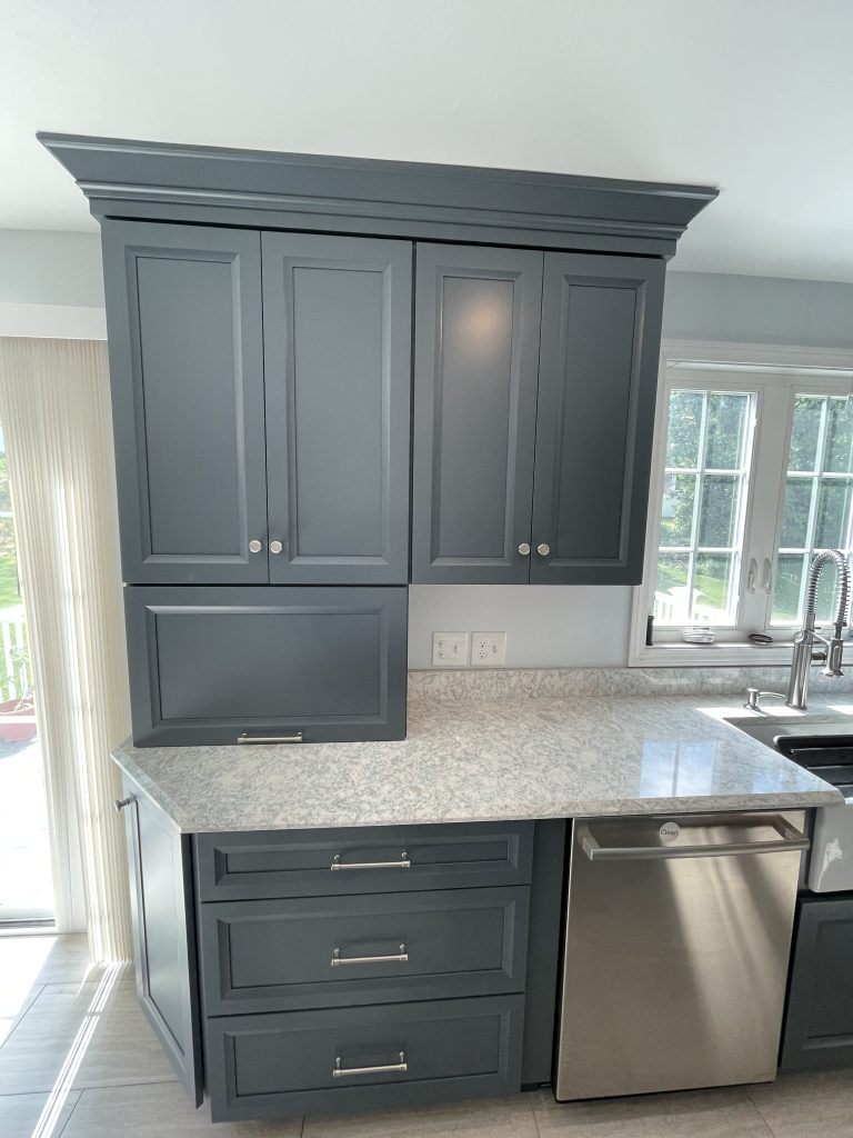 Grey cabinets in renovated kitchen